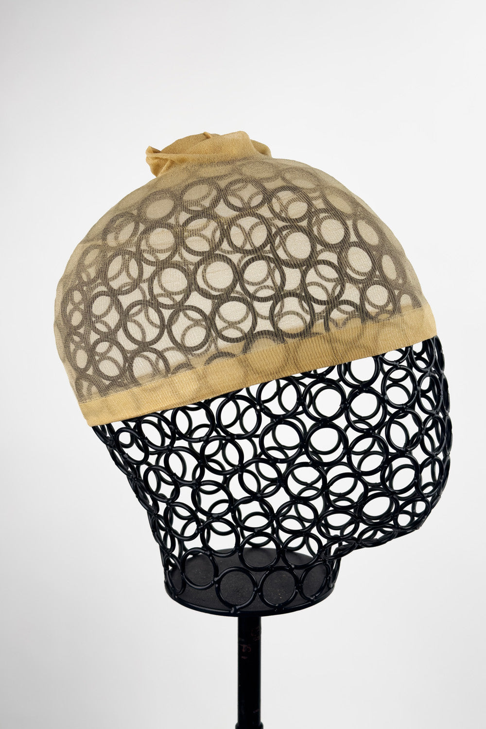 BHBD Wig cap shown on a wigstand