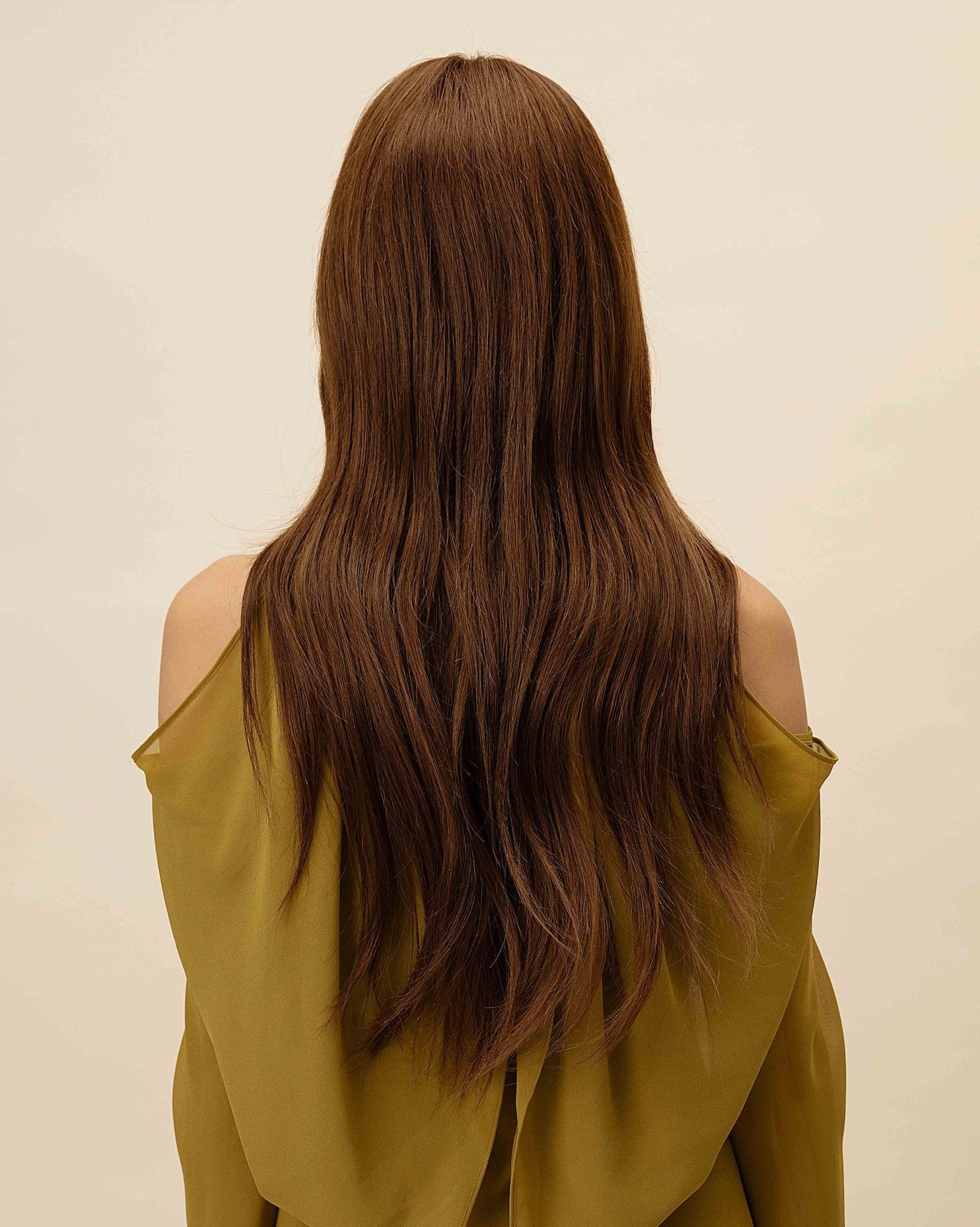 Arianna Wig – 50cm full lace wig shown from the back; natural brown Remy hair with hand-tied strands and soft layers.