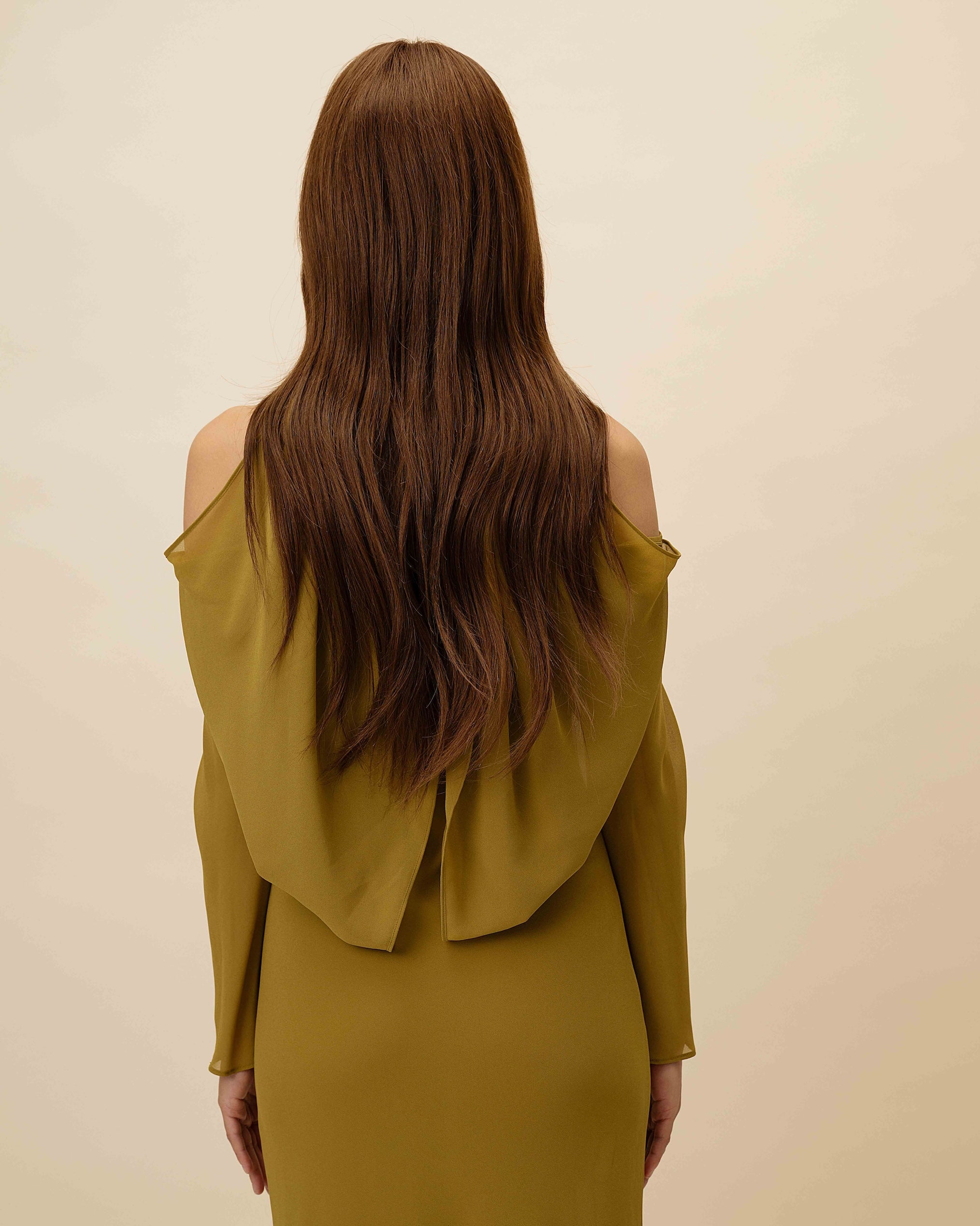 Arianna Wig – 50cm full lace wig shown from the back; natural brown Remy hair with hand-tied strands and soft layers.