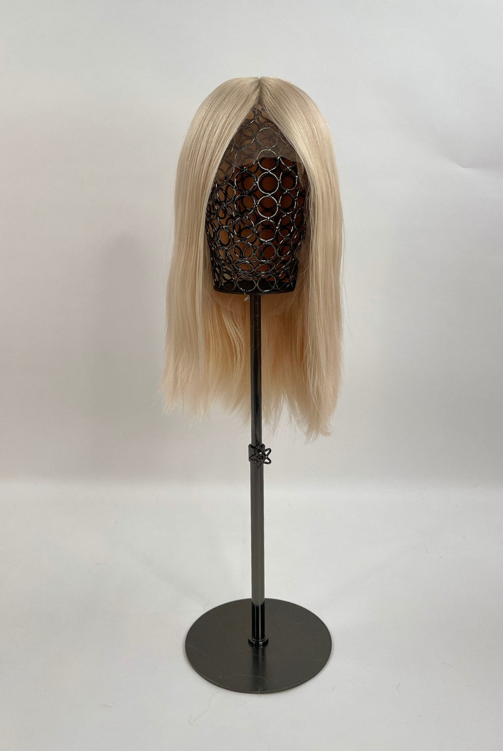 Bianca Wig – light blonde, 30cm full-lace wig; 100% Remy hair with transparent Swiss lace and natural density on a wig stand.