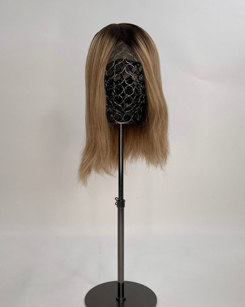 Serena Wig – dark brown root lighter brown lengths, 30cm full-lace wig; 100% Remy hair with transparent Swiss lace; shown on wig stand.