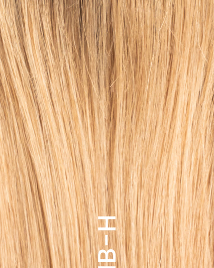 Close-up of hair topper in highlighted blond shade (5B/8N/10NB-H) with darker roots and soft blended blond highlights.