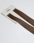 Tape Extensions 5B – pre-taped Remy human hair extensions in medium brown shade; seamless, soft and tangle-free; comes in 35cm, 50cm, and 60cm. 100% Remy hair, gentle extensions.