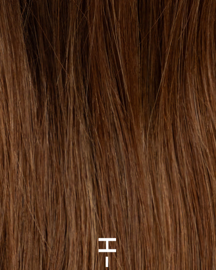 Signature Base hair topper in warm light brown color with subtle golden undertones, natural density, and a seamless blend.