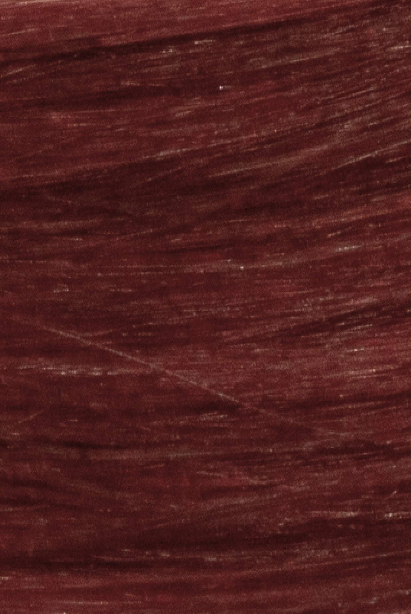 Tape Extensions 5R – pre-taped Remy human hair extensions in medium red shade; seamless, soft and tangle-free; comes in 35cm, 50cm, and 60cm. 100% Remy hair, gentle extensions.