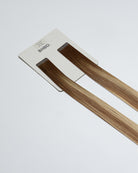 Tape Extensions 6N/11N/9NB – pre-taped Remy human hair extensions in medium natural brown, medium blonde, and natural beige blonde mix; seamless, soft and tangle-free; comes in 35cm, 50cm, and 60cm. 100% Remy hair, gentle extensions.