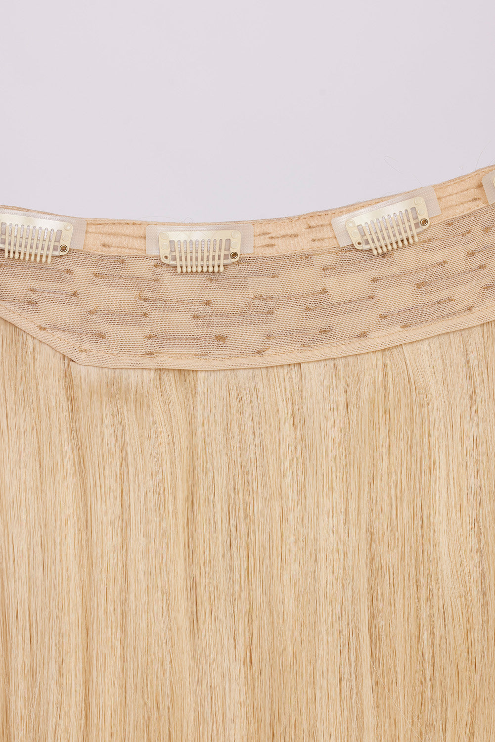Showing the clips inside the hair extensions