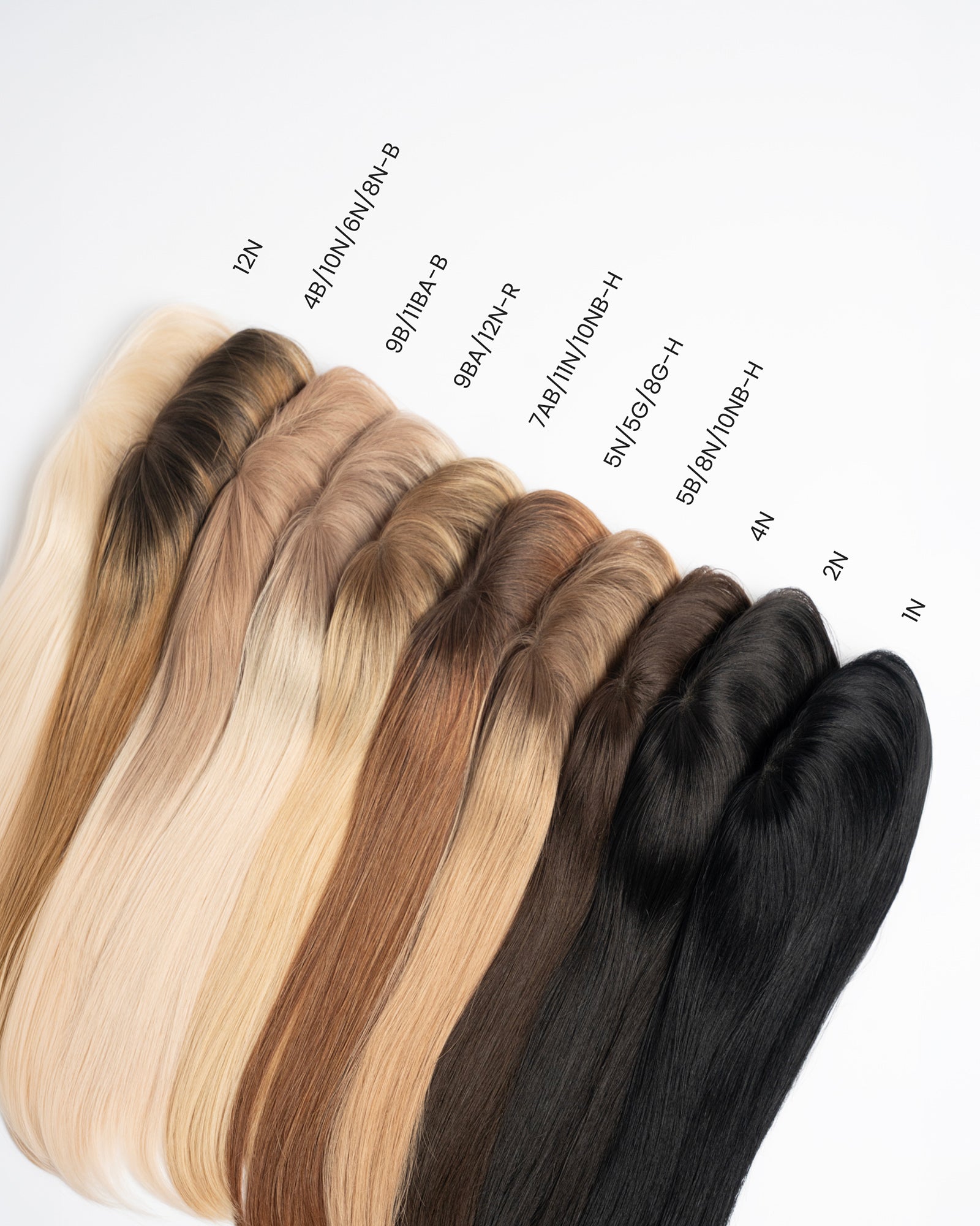 Hair topper color range showing multiple shades from blonde to black, including balayage and rooted tones.