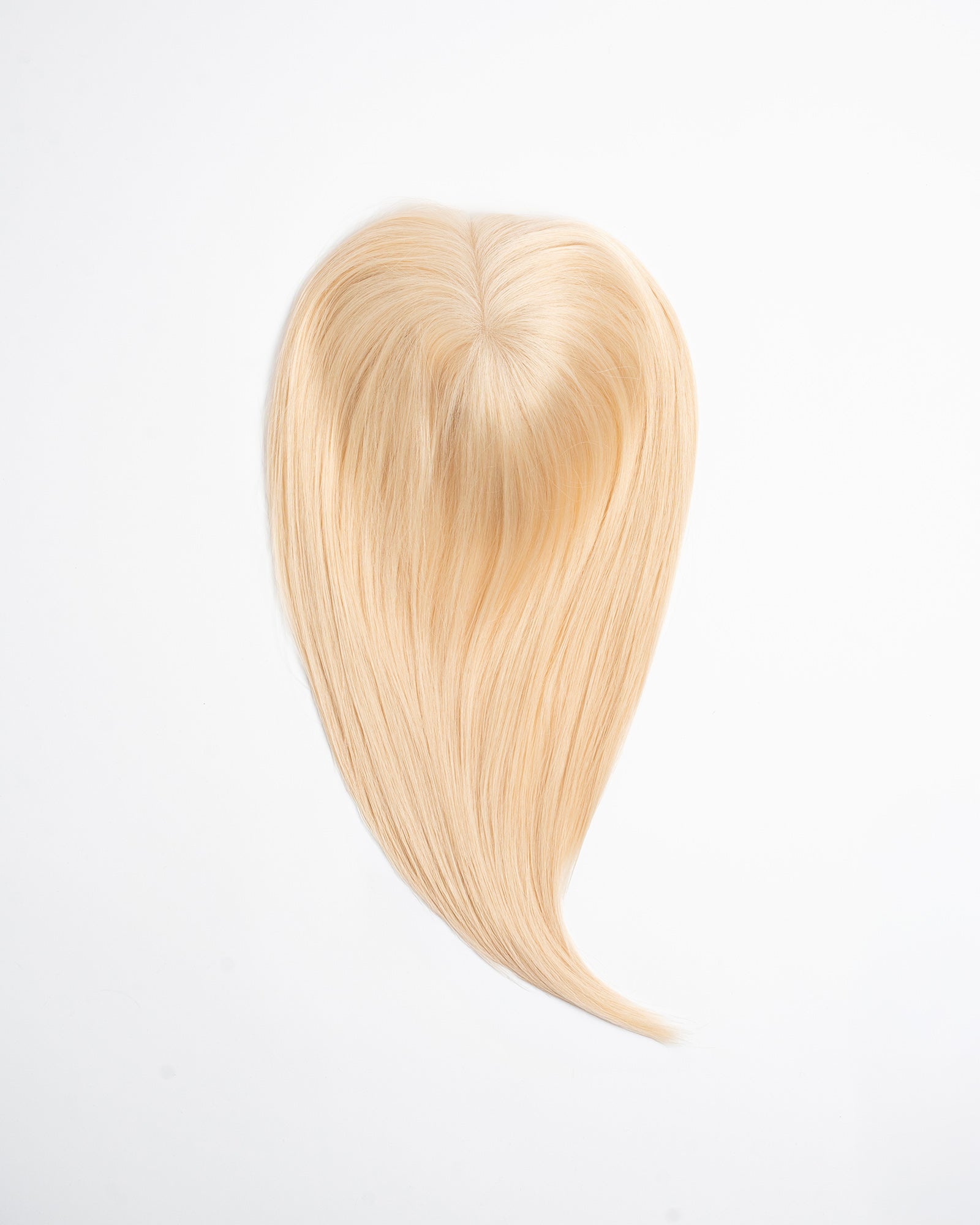 Hair topper Full Crown in lightest blond shade (12N) with full coverage and natural volume on a white background.