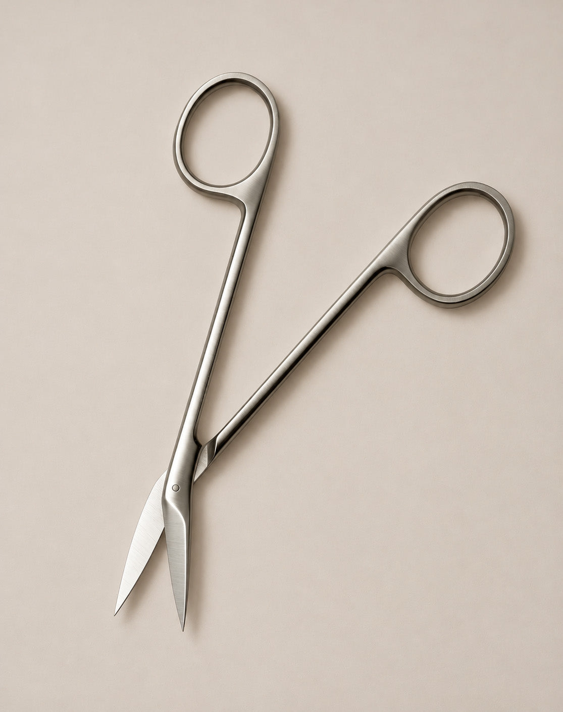 opened wig lace scissor on white background