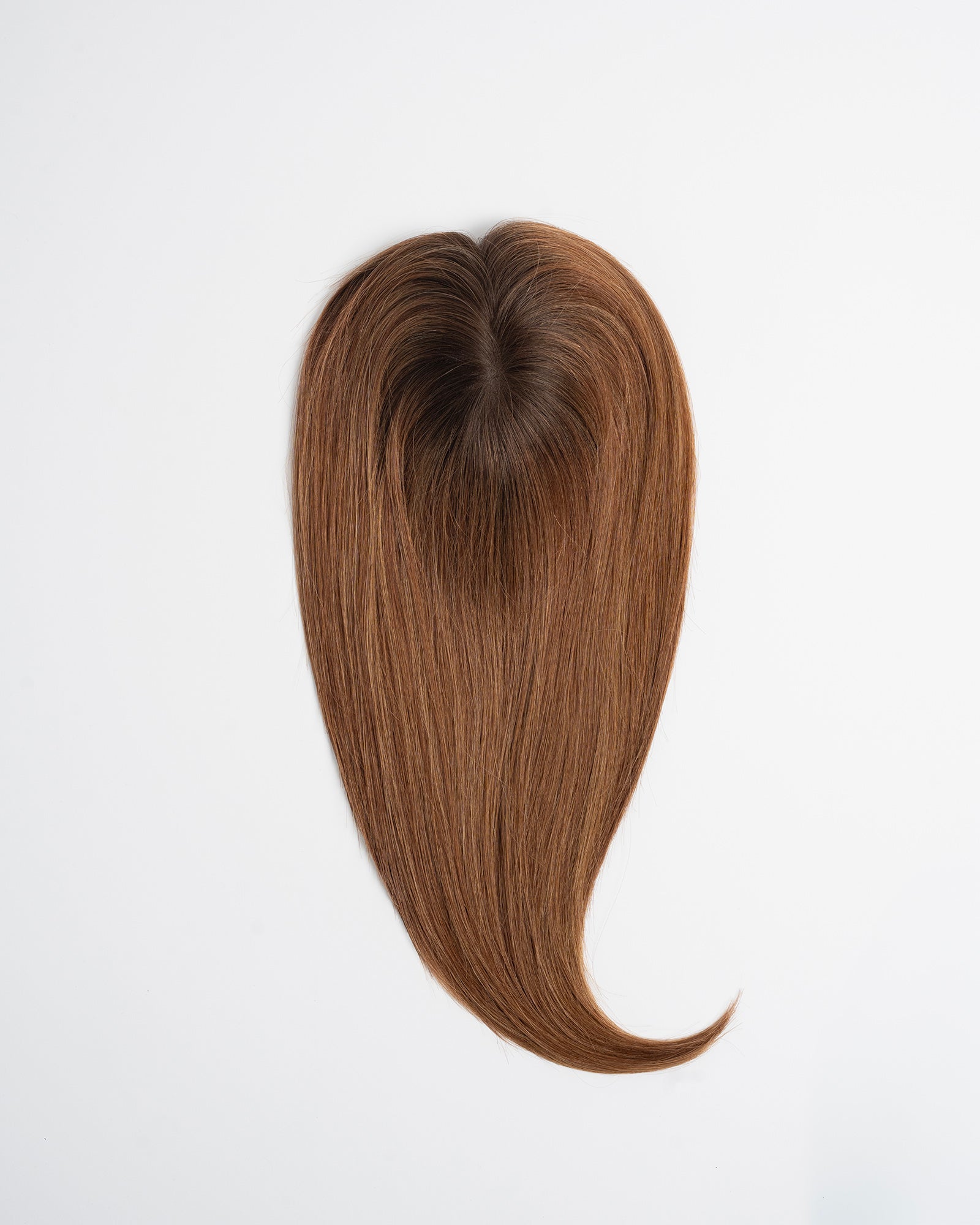 Hair topper Signature Base in warm light brown shade with soft golden tones and natural volume on a white background.