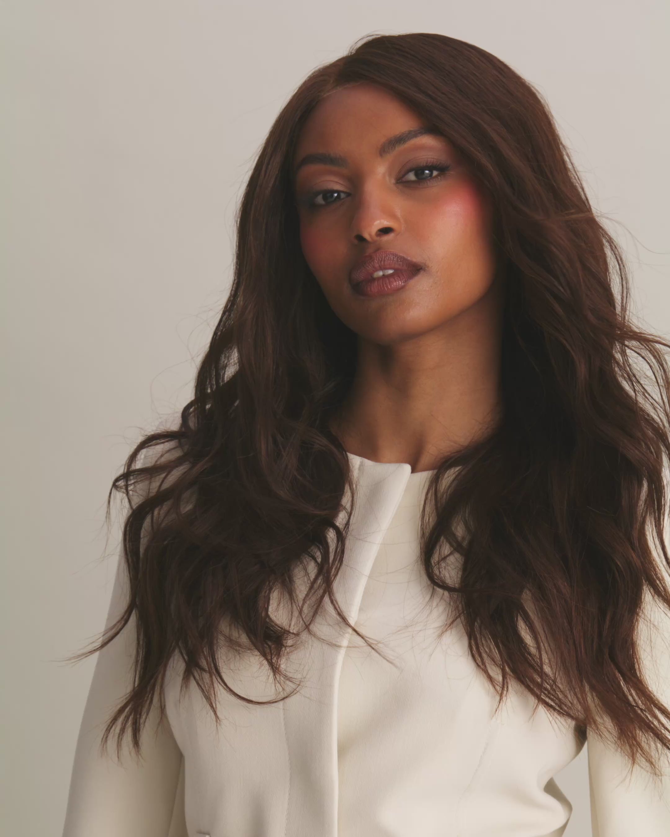 Model showing Valentina Wig – 40cm dark chocolate brown lace wig, hand-tied Remy hair with bleached knots for natural scalp look from different angles.
