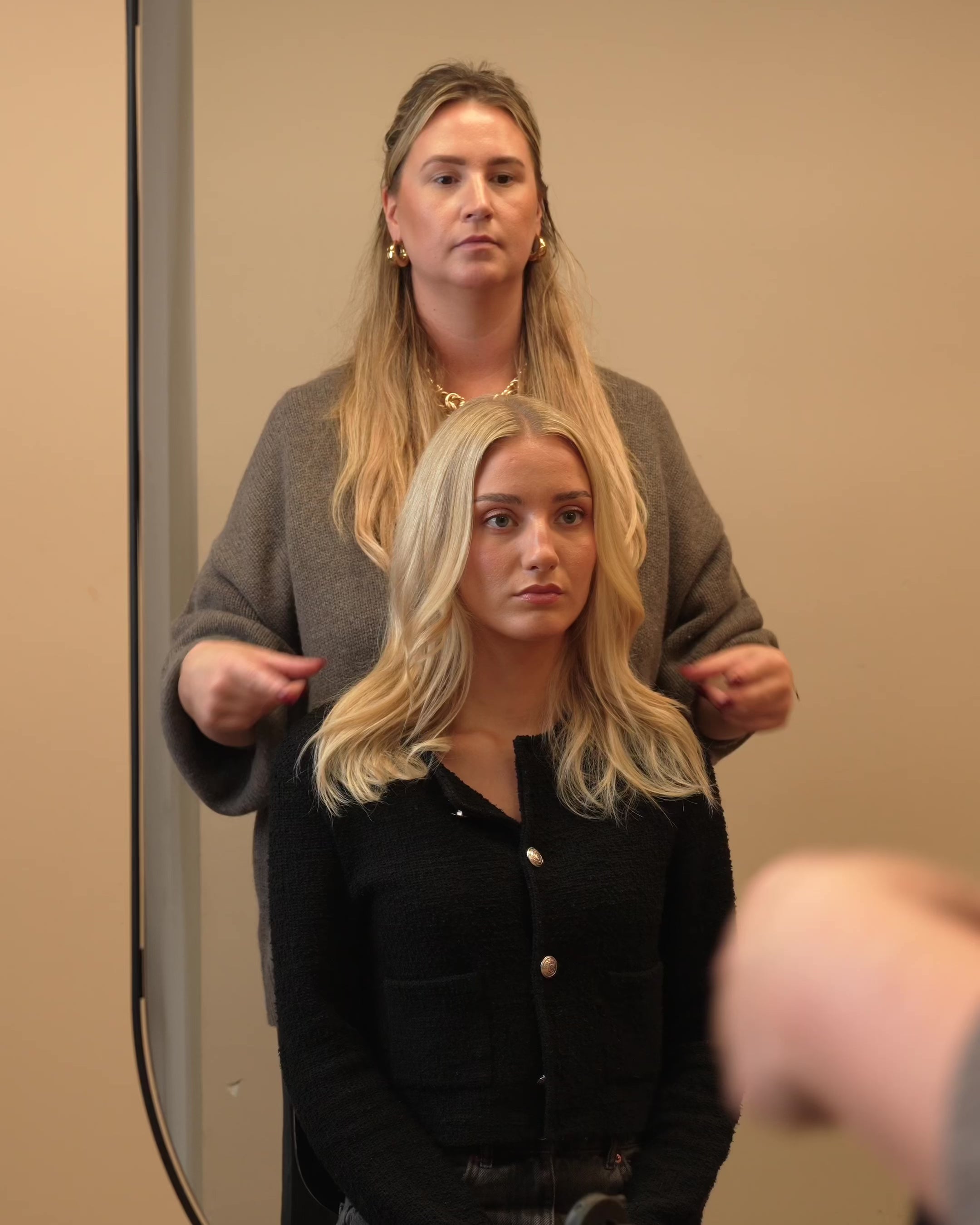 Video showing before BHBD hairband extensions on a woman in a chair then a hairdresser shows how to apply it and the after result.