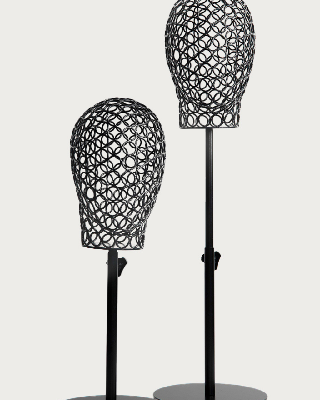 BHBD wig stand black metallic.