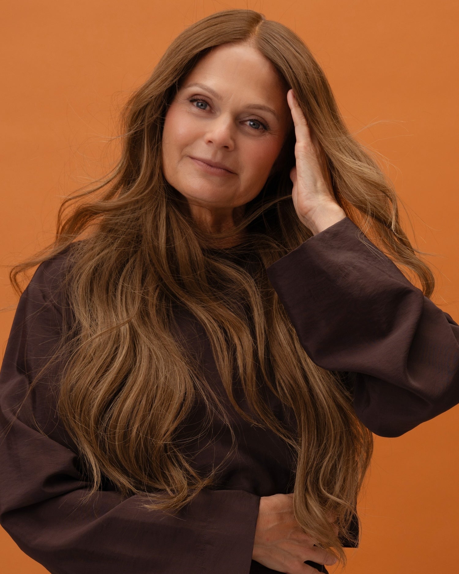 Model front view with Elena Wig – 50cm balayage lace wig with caramel brown roots blending into cool medium brown lengths; 100% Remy hair with HD lace.