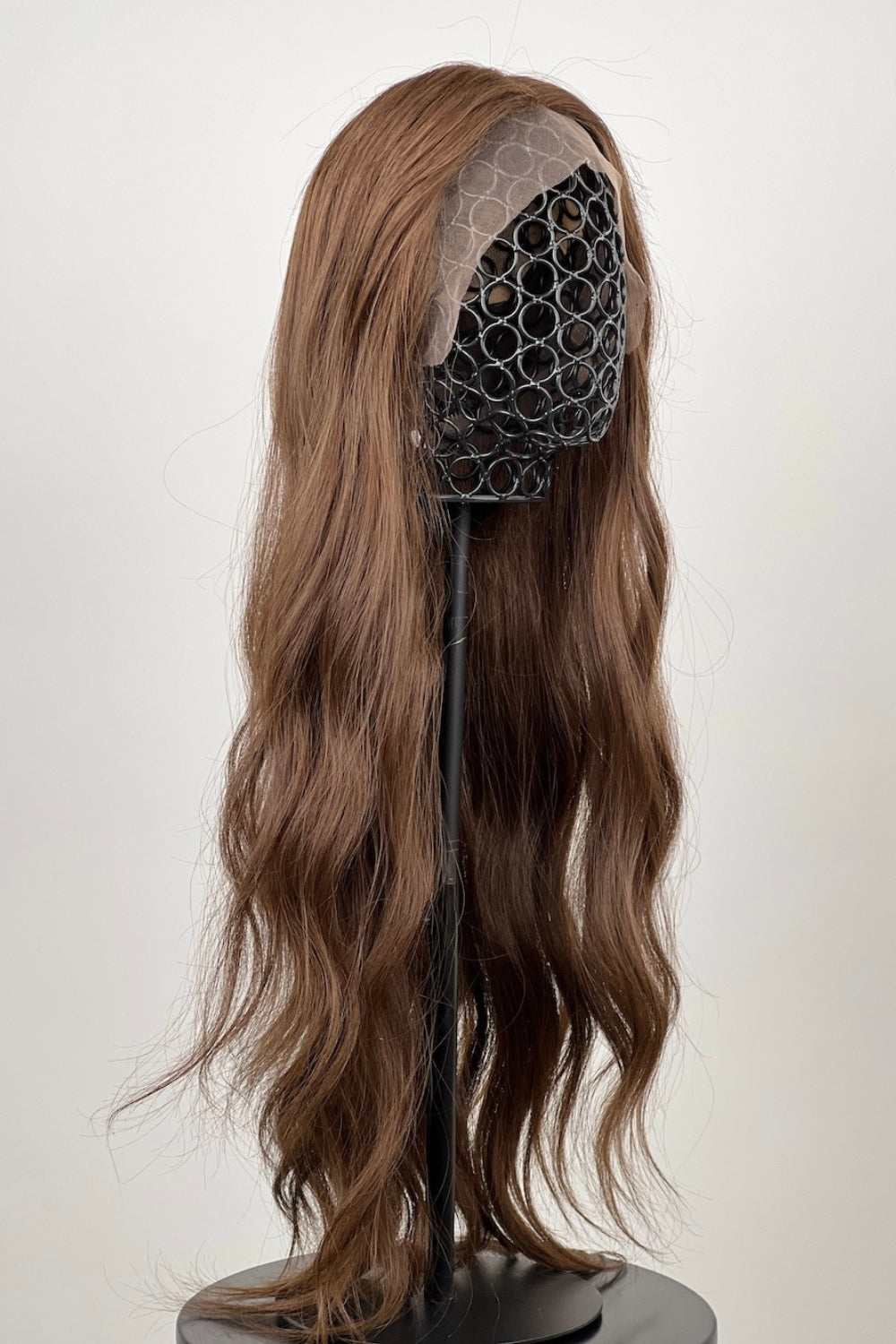 The wig is made with 100% human hair and comes in 60 cm. It has a mix of 3 colors to create a deep, warm and perfect brown.