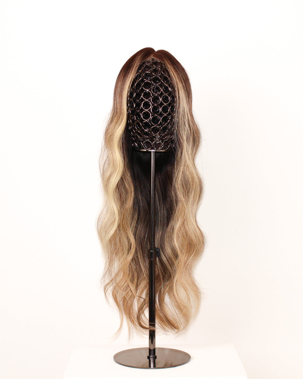 Balayage Wig 50 cm human hair with deep brown root and warm blonde balayage tones, hand-tied on HD lace front, displayed on wig stand. Front view