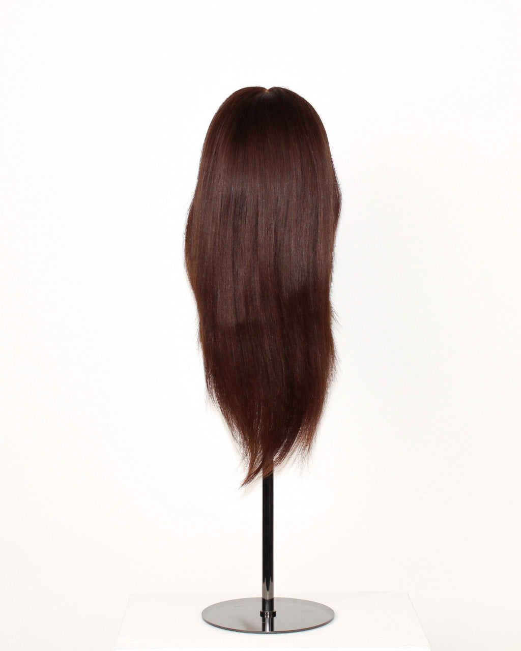 Peony Wig 30 cm dark brown human hair wig with softly layered finish and realistic scalp effect, displayed on stand.