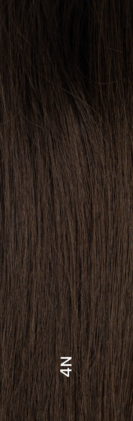 Close-up of hair topper in neutral medium brown shade (4N) with natural tone and soft shine.