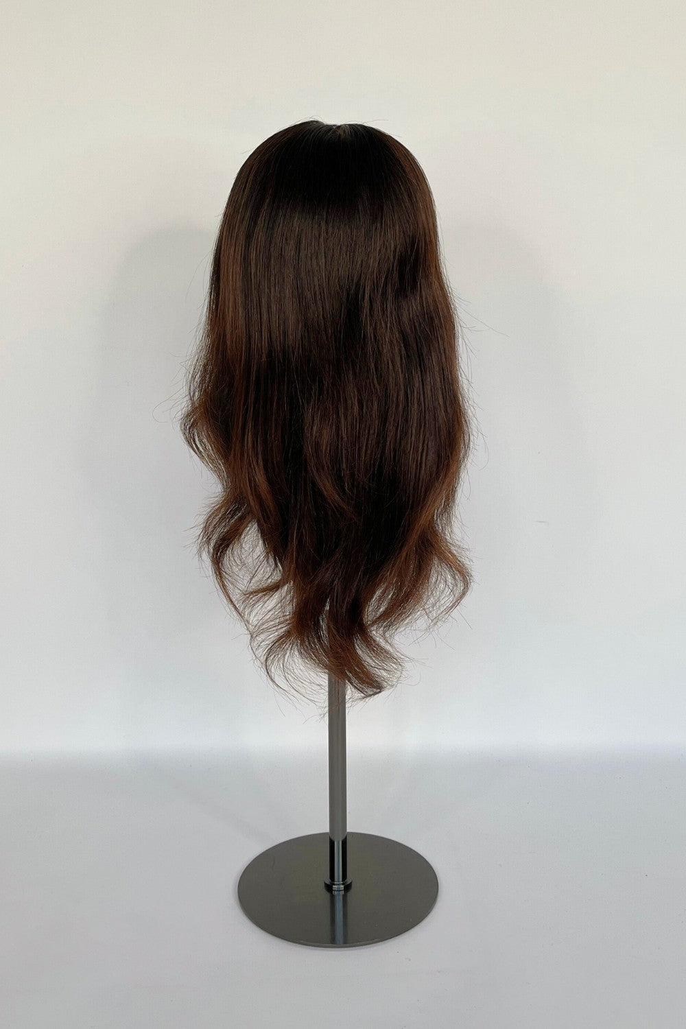 BHBD full lace wig in a rich chestnut brown shade with soft, natural waves. Made with 100% real Remy hair, providing a realistic parting and seamless fit for versatile styling.