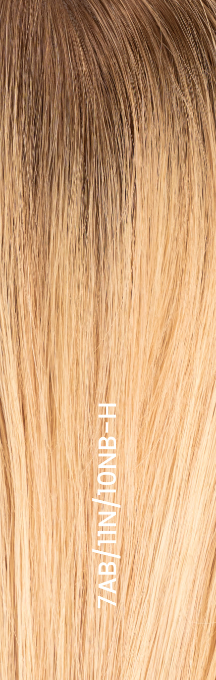 Close-up of hair topper in highlighted blond shade (7AB/11N/10NB-H) with soft blended highlights and natural dimension.