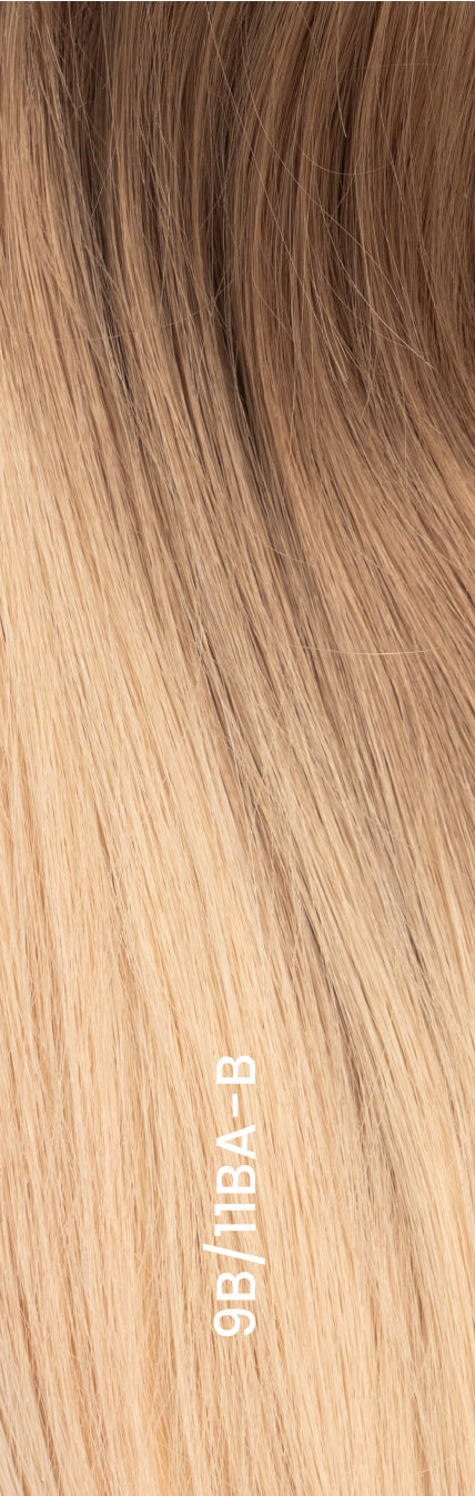 Close-up of hair topper in balayage blond shade with soft root blend into light blond lengths.