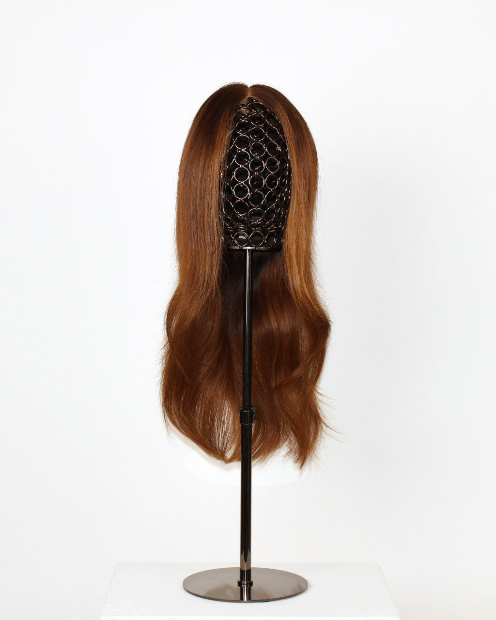 Ava Wig 40 cm human hair wig in dark-to-light copper balayage with money-piece highlights, hand-tied on HD lace front, displayed on stand. Front view