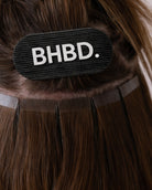 black velcro hair grip in hair