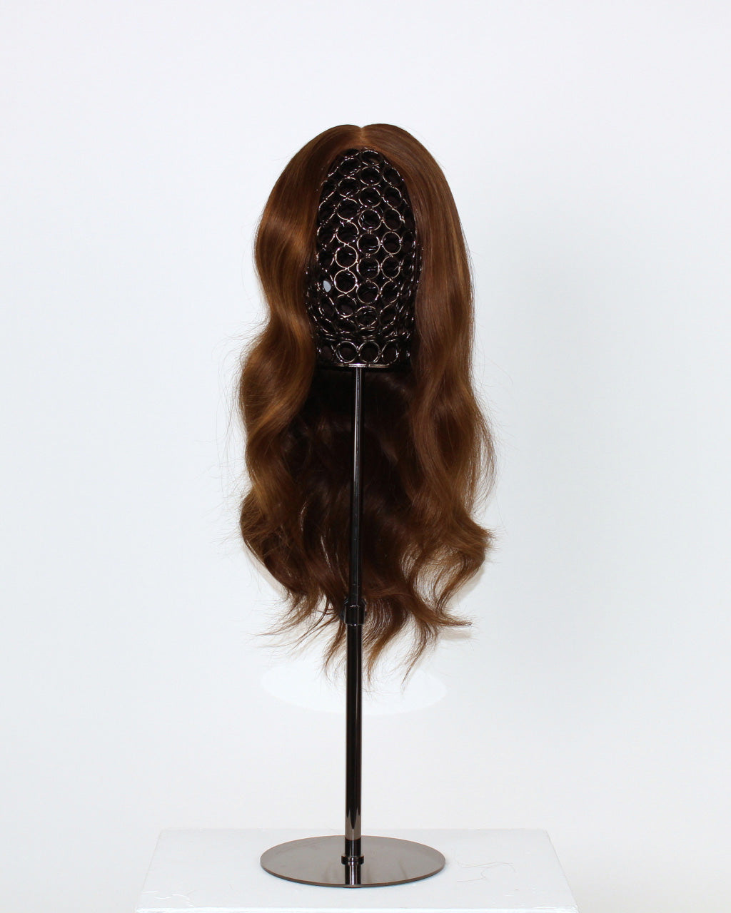Daisy Wig 40 cm human hair wig with dark brown base and light brown highlights, hand-tied on HD lace front, displayed on stand.