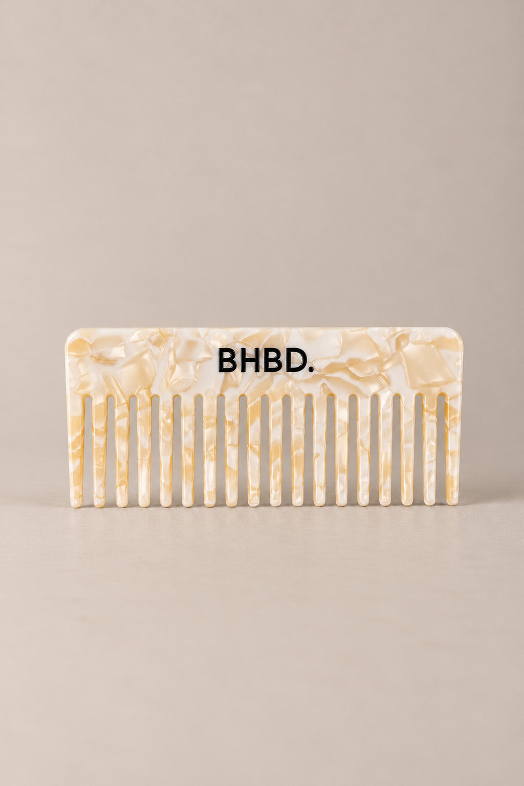 BHBD Comb – wide tooth comb for detangling hair and distributing hair masks and conditioner, featuring a marbled beige design with BHBD branding