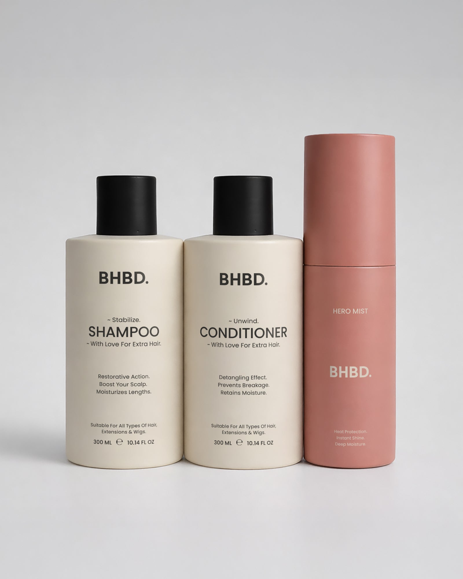 BHBD shampoo, conditioner, and hero mist on a light gray background