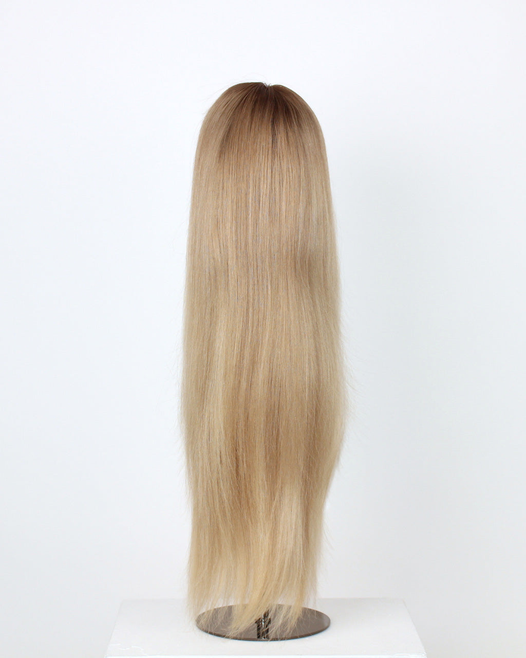 Ash Blonde Wig 40 cm Remy human hair with cool and warm blonde tones, darker root, and smooth layered finish, displayed back view on wig stand.