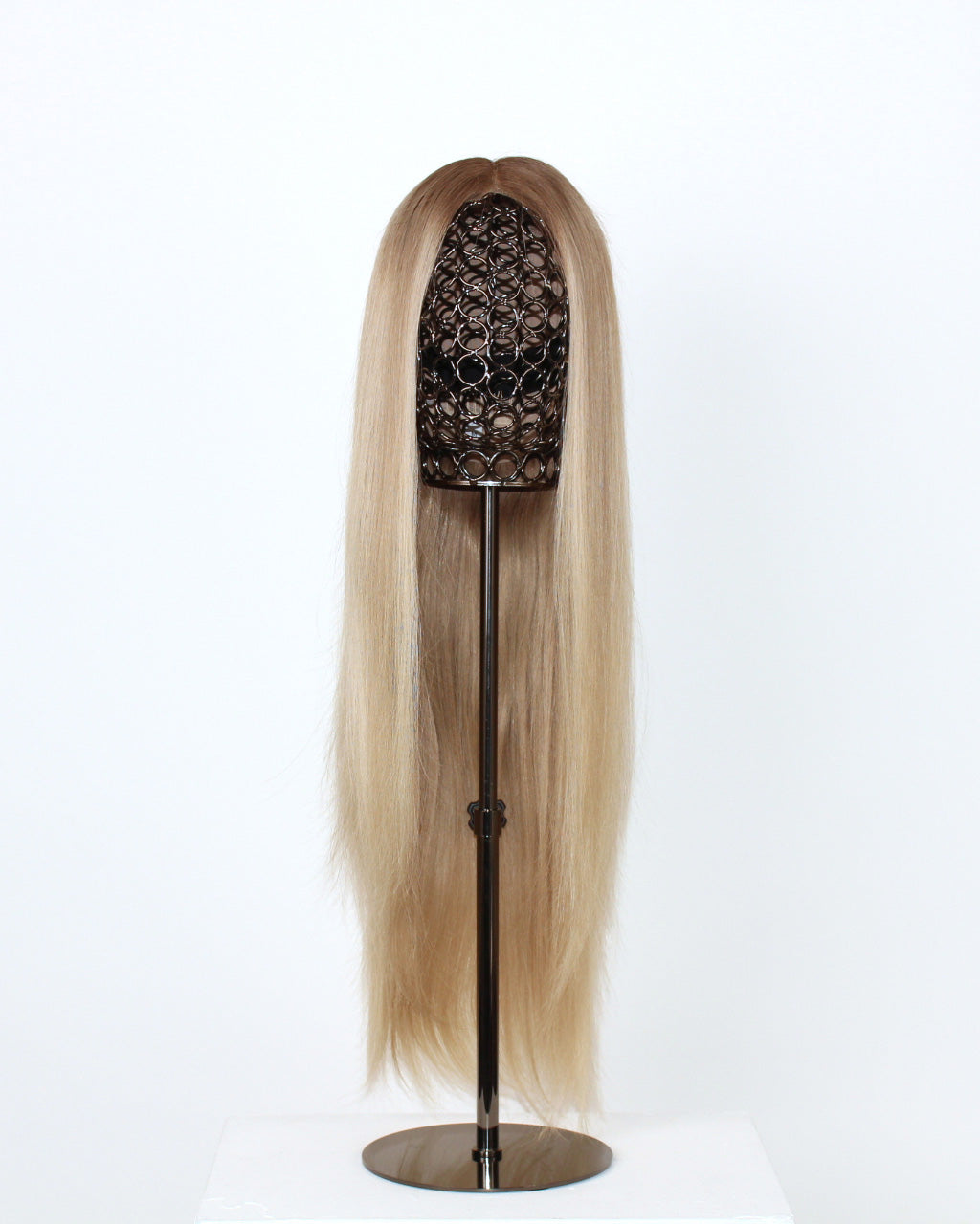Ash Blonde Wig 40 cm human hair with ashy dark root fading into soft blonde highlights, hand-tied on HD lace, displayed front view on a wig stand.