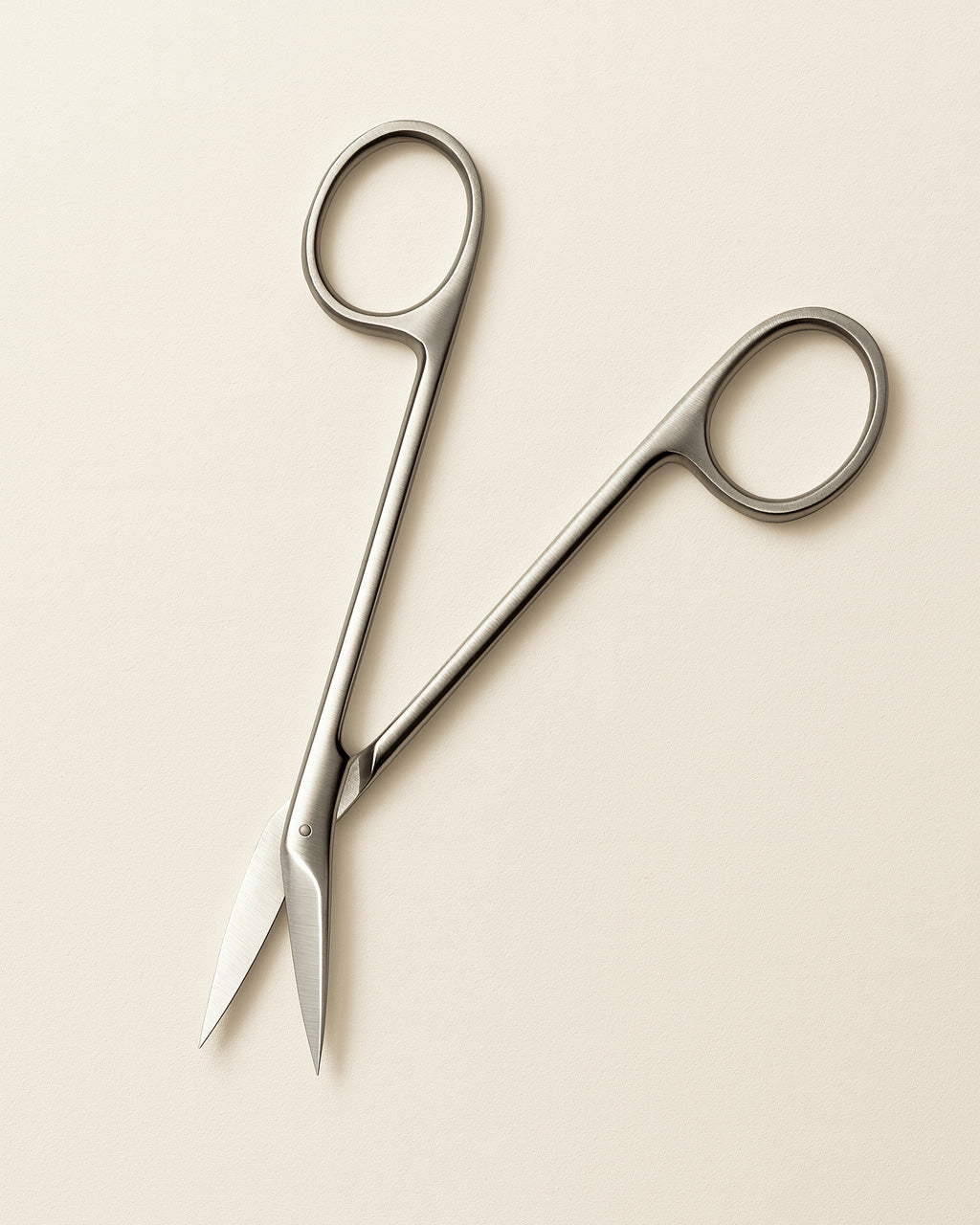 opened wig lace scissor on white background