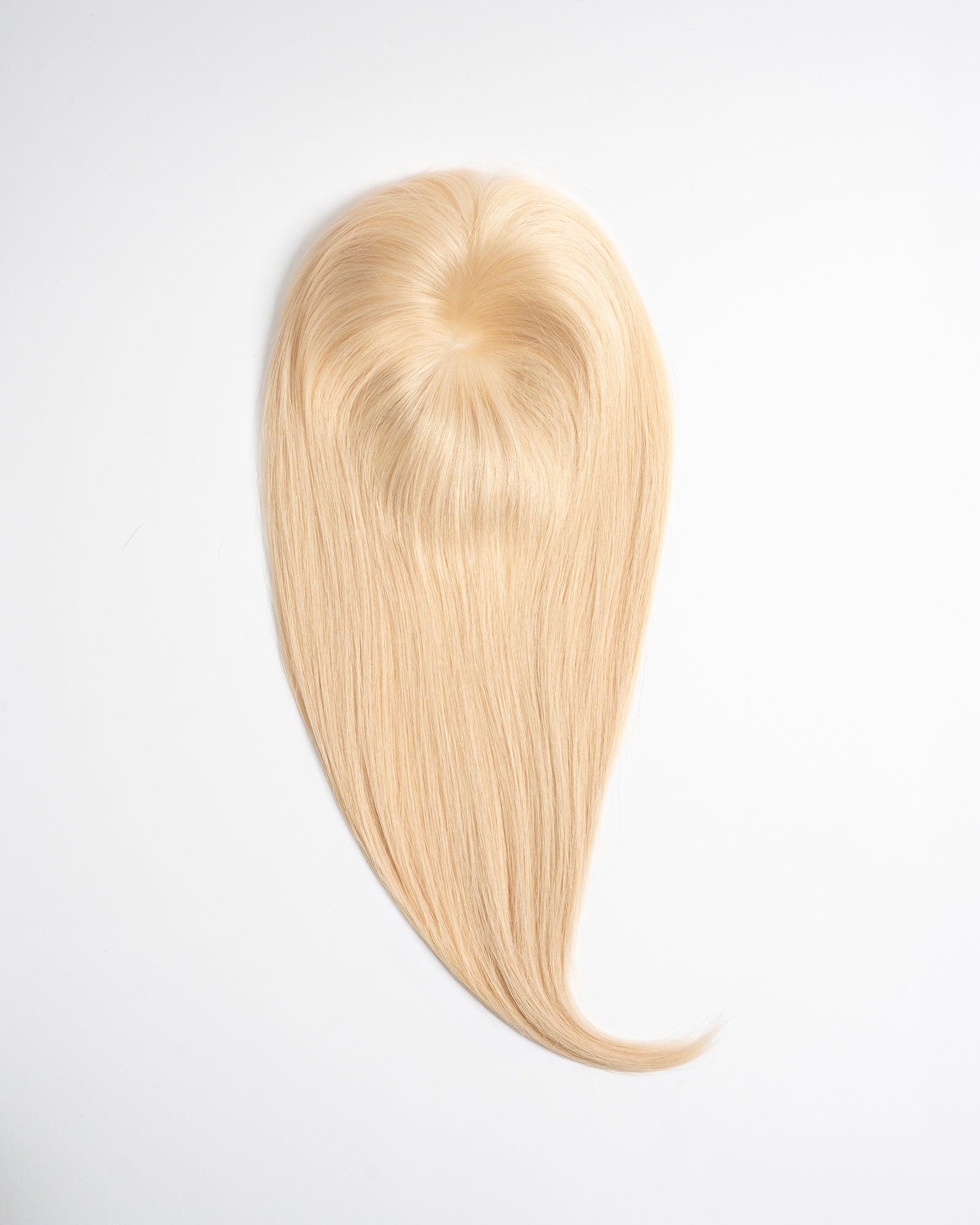 Hair topper Signature Base in light blonde shade (12N) with natural volume and seamless blend on a white background.