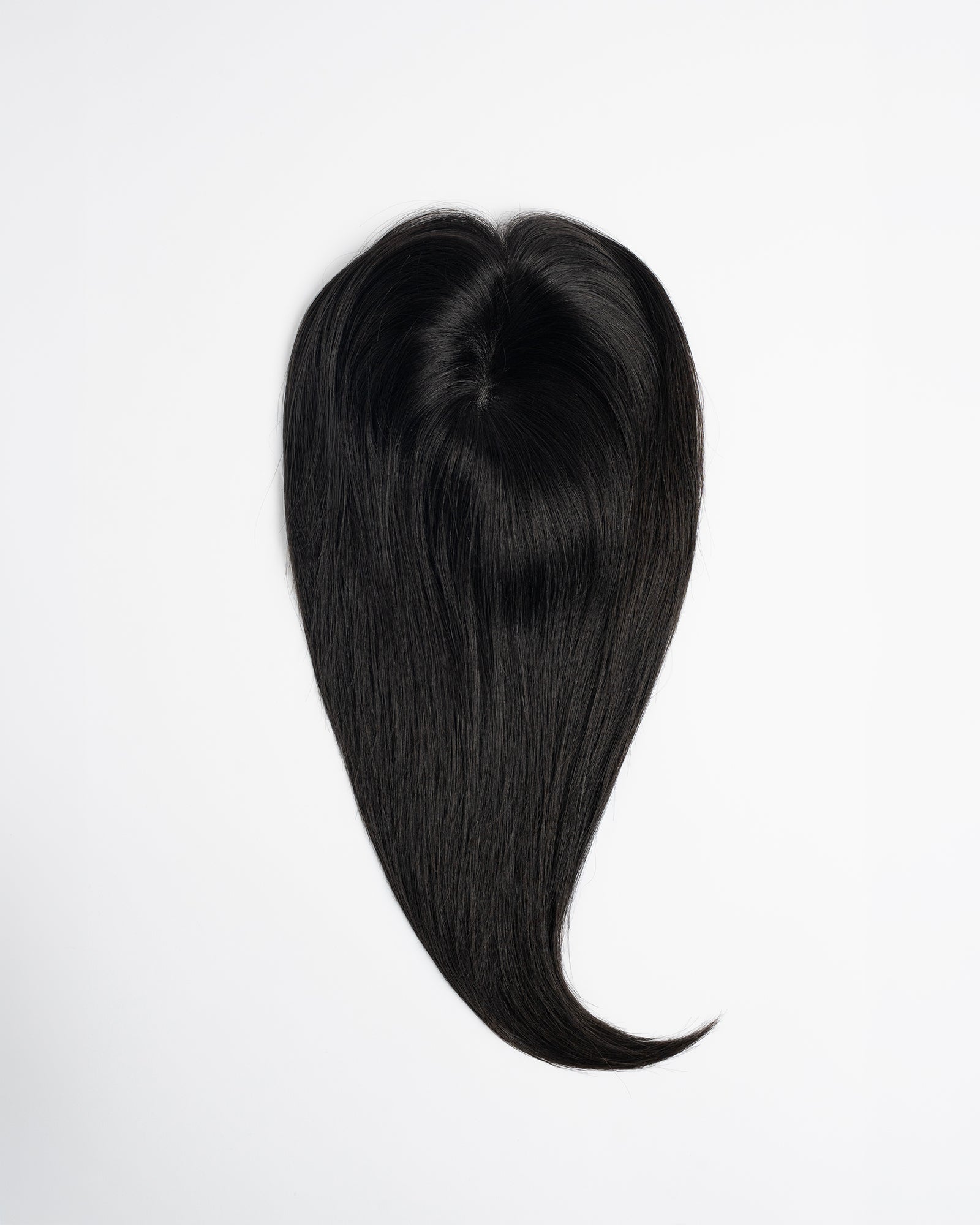 Hair topper in dark brown/black shade (2N) with natural volume and length on a white background.