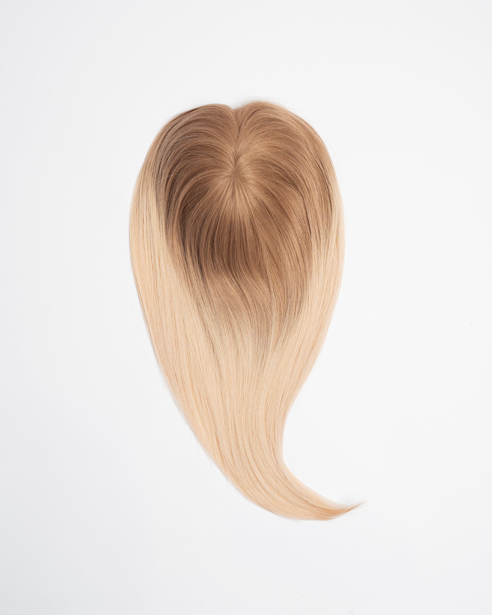 Hair topper Signature Base in balayage blond shade with soft root melt and blended light blond lengths on a white background.