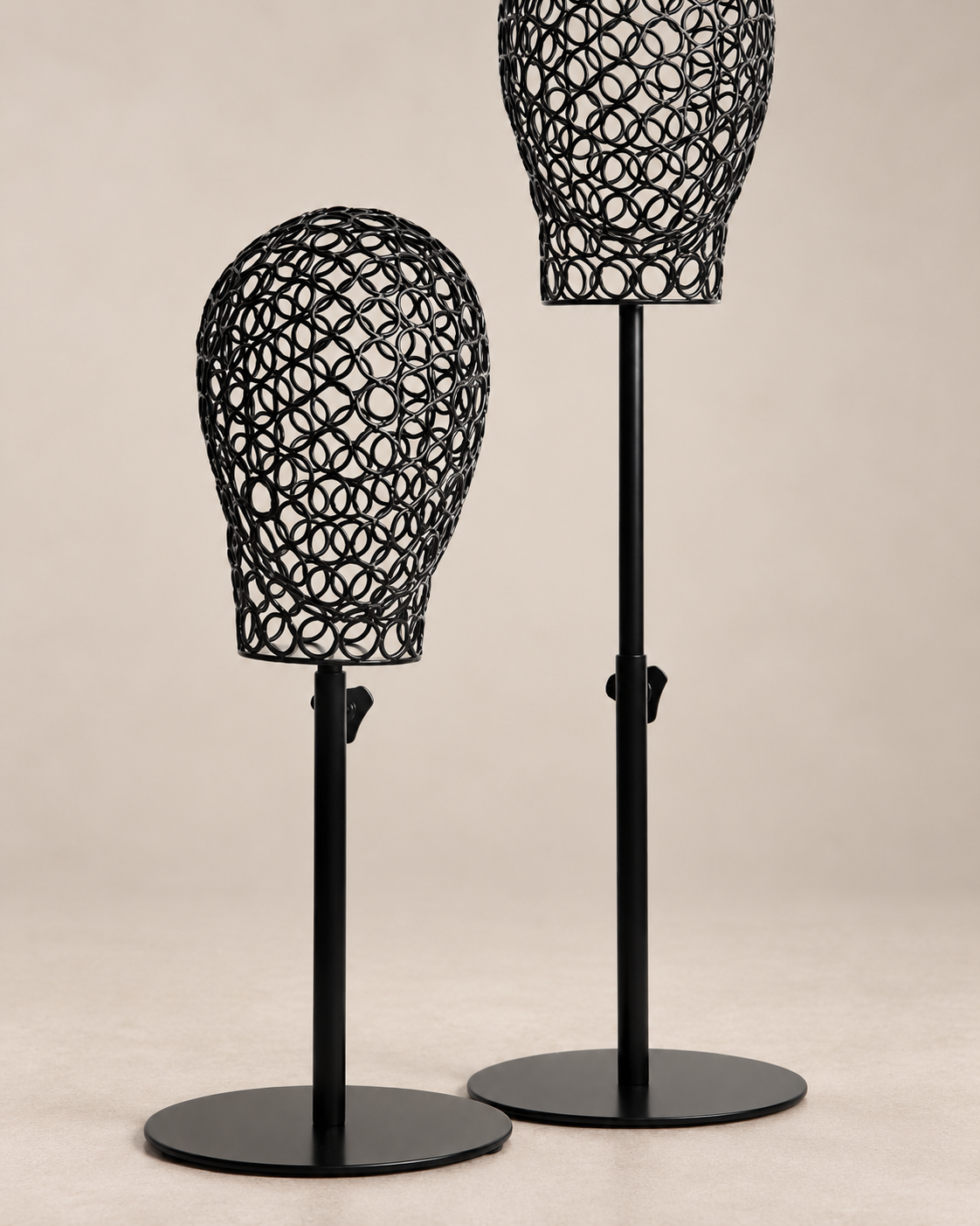 BHBD wig stand black metallic.